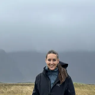 Brit Gardner standing in an Icelandic landscape